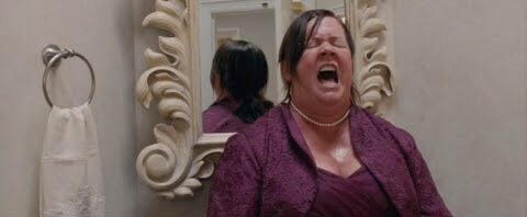 Bridesmaids (2011) pic from around the web. What's going on? I dunno, I think she's shitting?